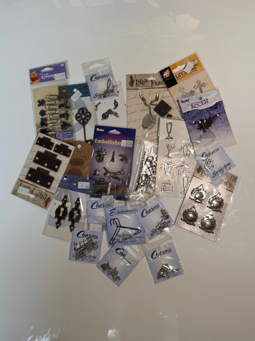 #109  - 21 Charms, etc for jewelry and scrapbooking